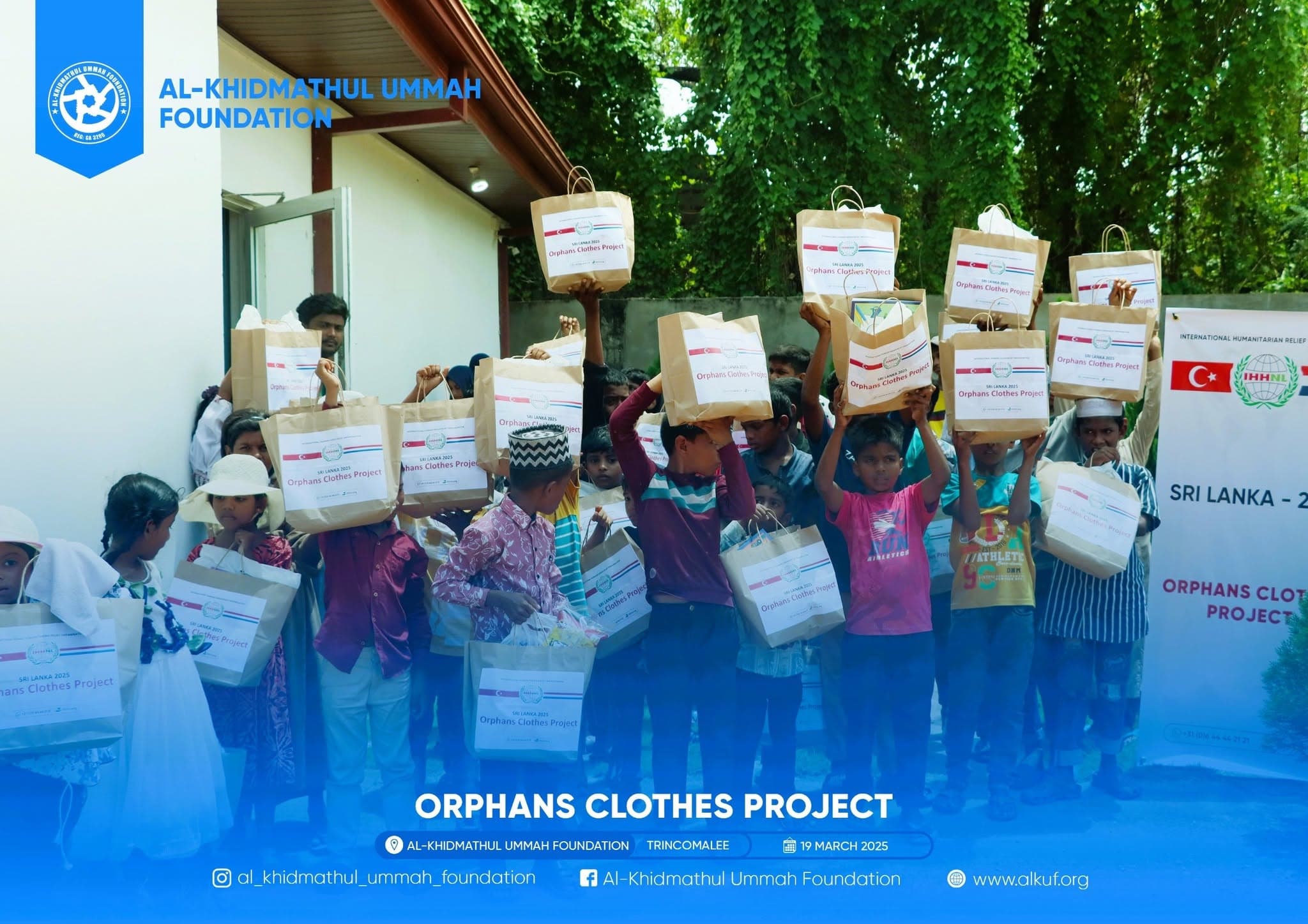 Orphaned children carrying ALKUF care packs